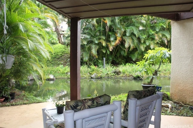 view of patio featuring a water view