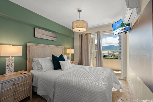 bedroom featuring light tile patterned flooring and a wall mounted AC