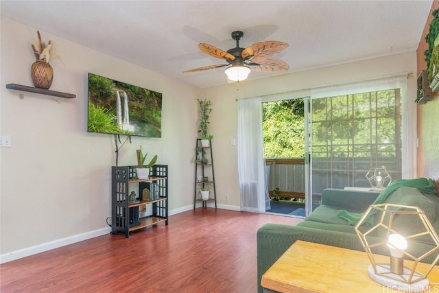 interior space featuring ceiling fan and dark wood-type flooring