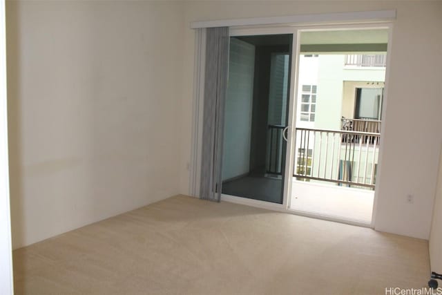 empty room featuring light colored carpet