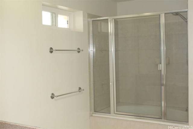 bathroom featuring walk in shower