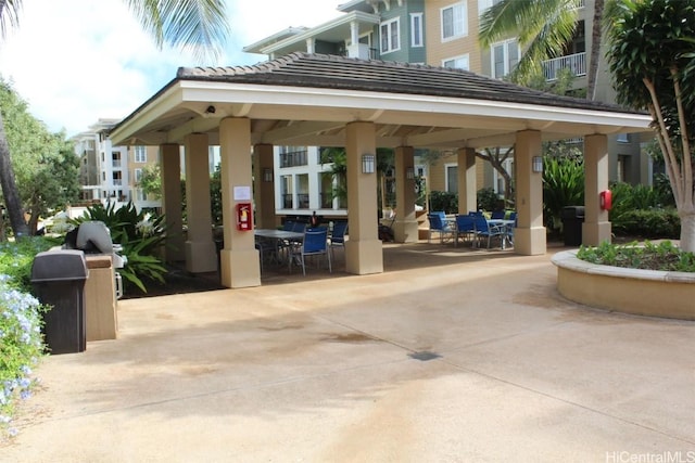 view of property's community featuring a gazebo and a patio area