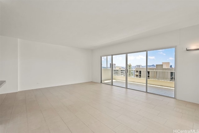 unfurnished room featuring a healthy amount of sunlight