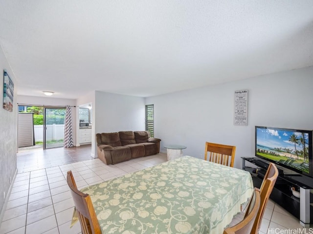 dining room featuring light tile patterned floors