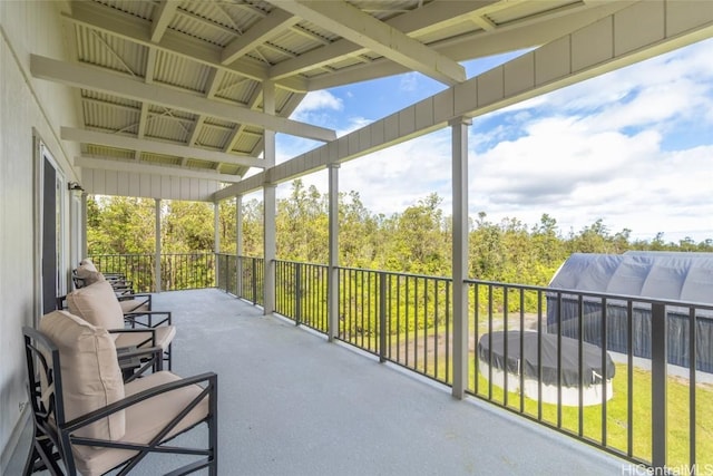 sunroom / solarium with vaulted ceiling