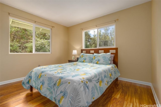 bedroom featuring hardwood / wood-style flooring