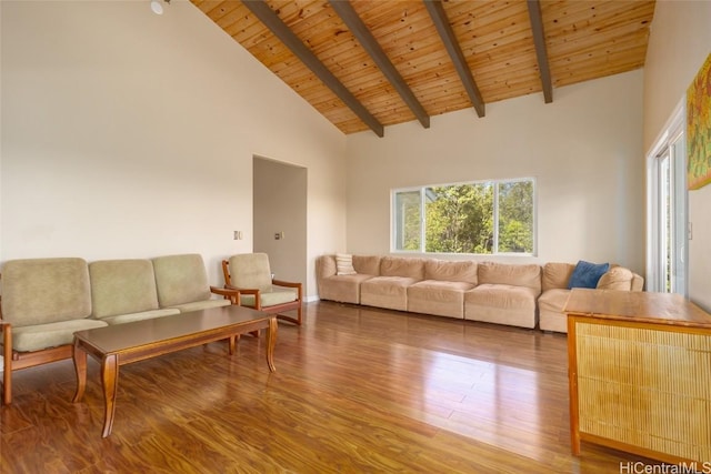 living room with beamed ceiling, hardwood / wood-style floors, high vaulted ceiling, and wood ceiling