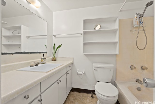 full bathroom with vanity, toilet, and tiled shower / bath combo