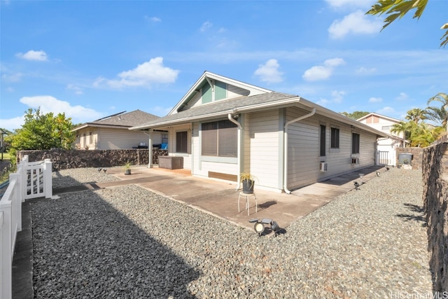 rear view of property with a patio area