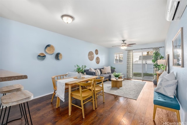 dining room with a wall mounted air conditioner, ceiling fan, and dark wood-type flooring