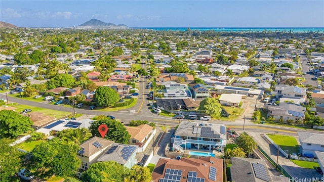 birds eye view of property with a mountain view