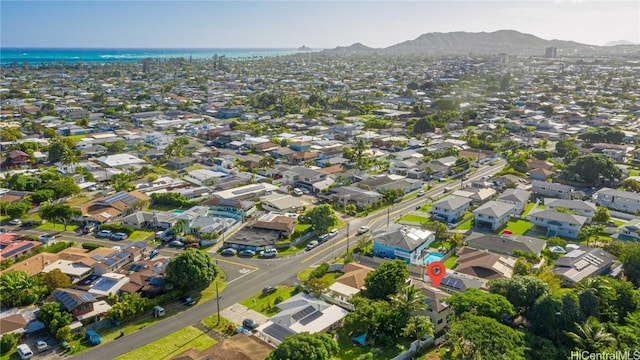 birds eye view of property featuring a mountain view