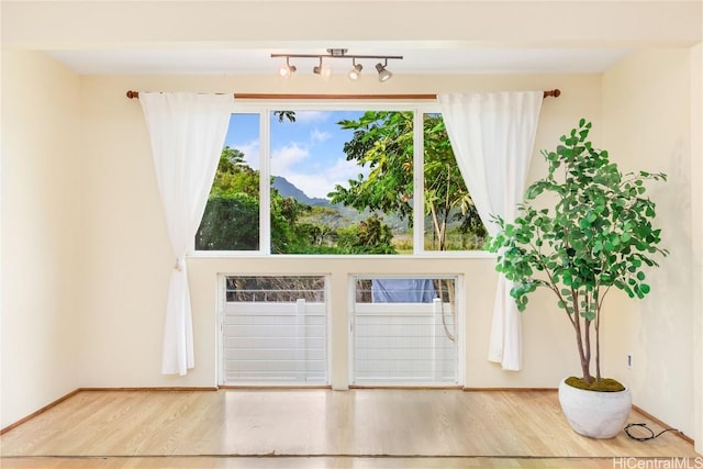 doorway to outside with hardwood / wood-style floors