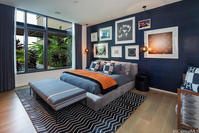 bedroom with hardwood / wood-style floors