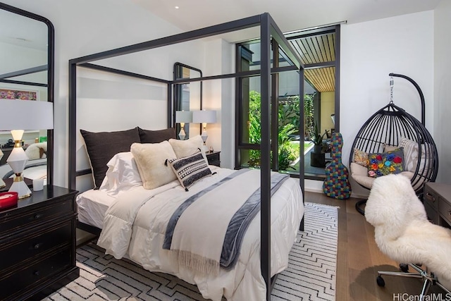 bedroom featuring hardwood / wood-style flooring