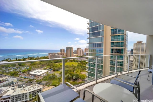 balcony featuring a water view