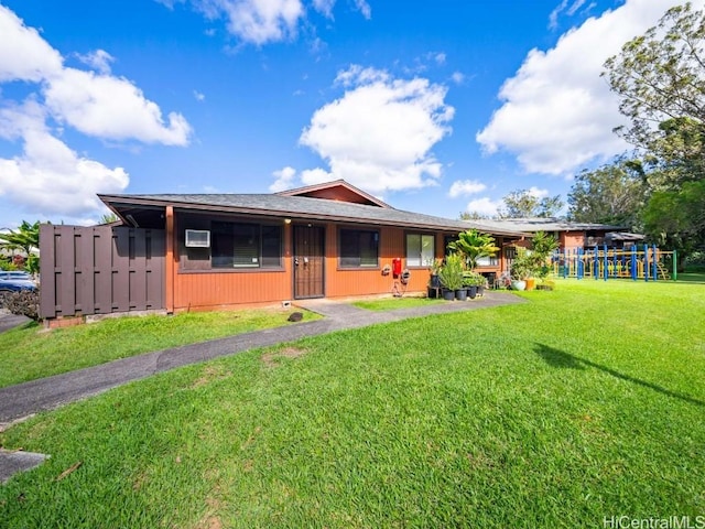 ranch-style house with a front lawn