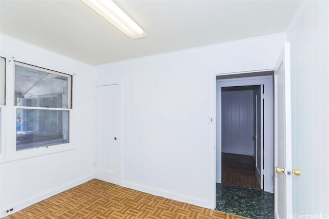 spare room with light parquet floors