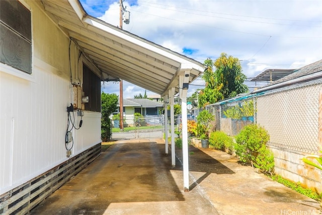 view of patio / terrace with a carport