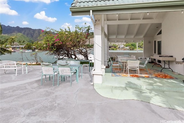 view of patio featuring a mountain view