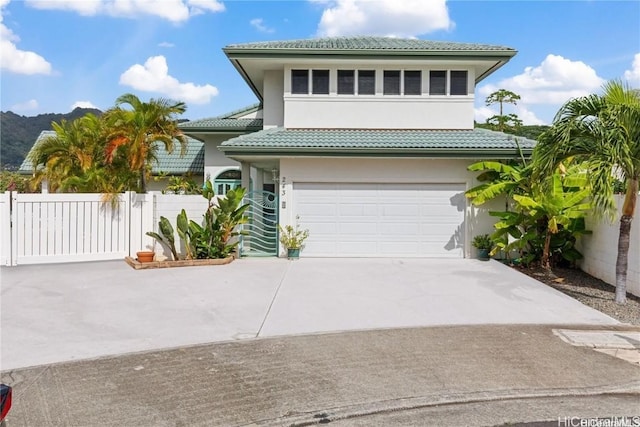 view of front of property featuring a garage