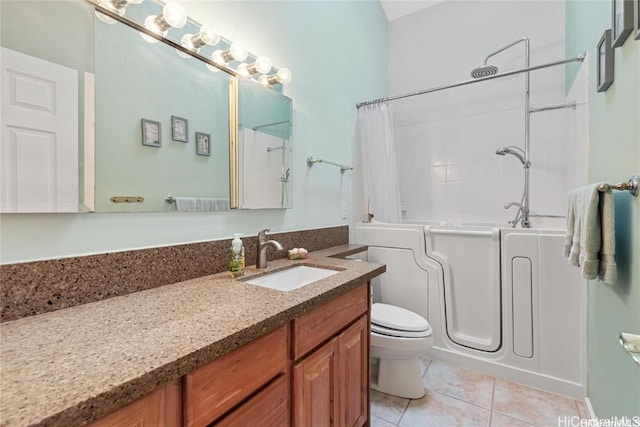 full bathroom featuring shower / bath combo with shower curtain, tile patterned flooring, vanity, and toilet