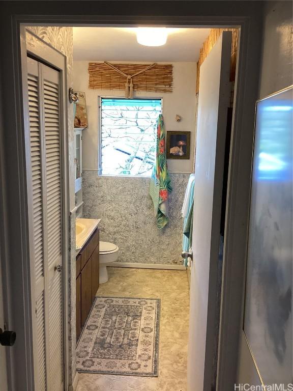 bathroom with vanity and toilet