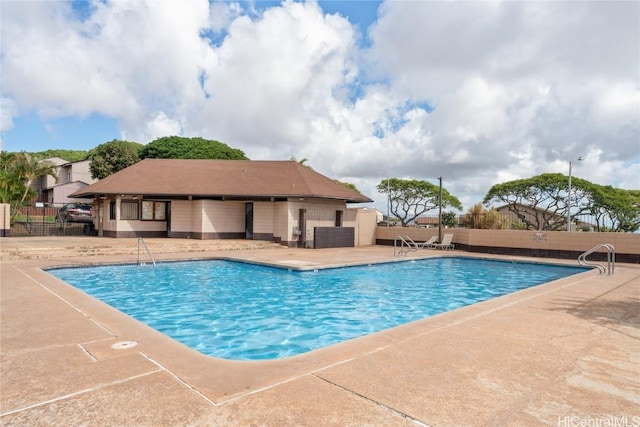 view of pool featuring a patio area