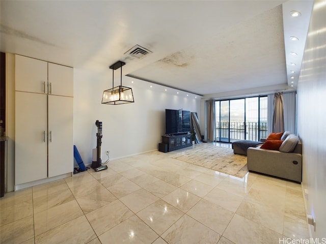 unfurnished living room featuring a textured ceiling