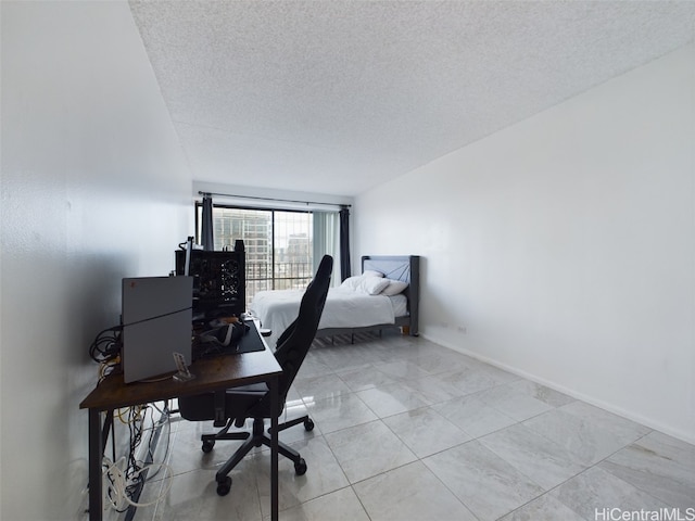 office area featuring a textured ceiling