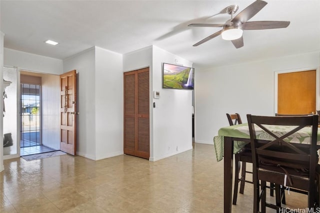 dining area with ceiling fan