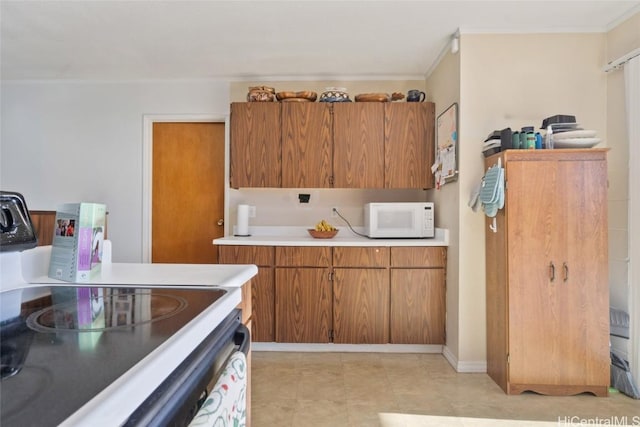 kitchen featuring range with electric cooktop