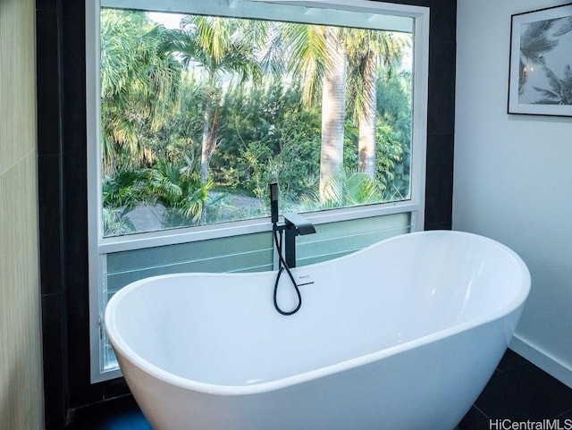 bathroom with a washtub