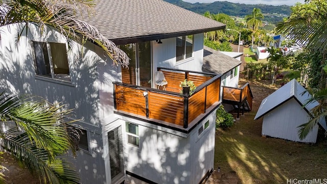 back of property with a mountain view