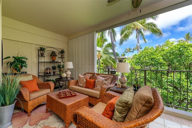 balcony with outdoor lounge area and ceiling fan