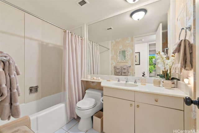 full bathroom with tile patterned floors, vanity, shower / tub combo, and toilet