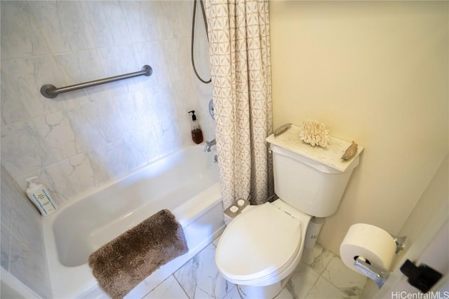 bathroom featuring shower / bath combo and toilet