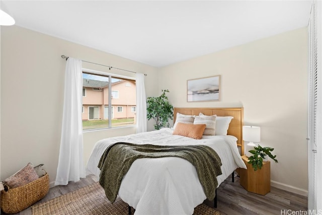 bedroom featuring hardwood / wood-style flooring