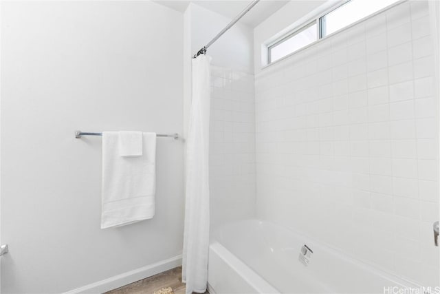 bathroom with shower / bath combo