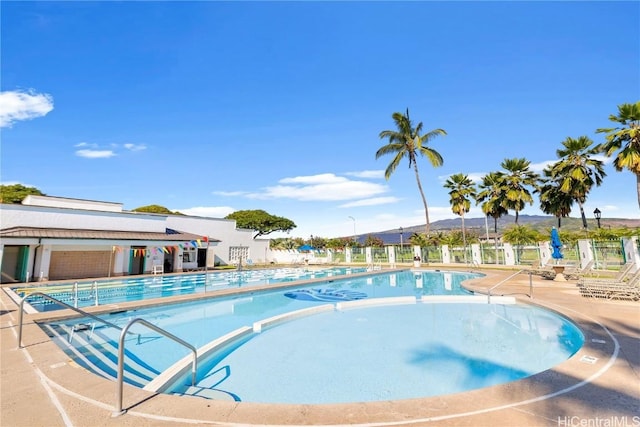 view of swimming pool featuring a patio