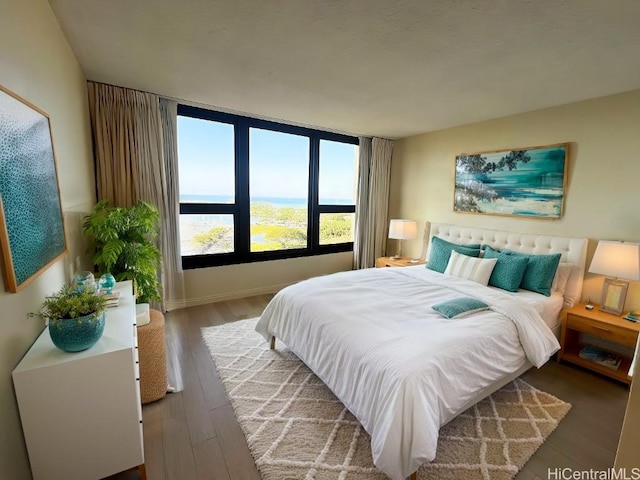 bedroom featuring hardwood / wood-style flooring