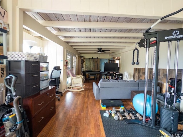 exercise area with wood-type flooring and ceiling fan