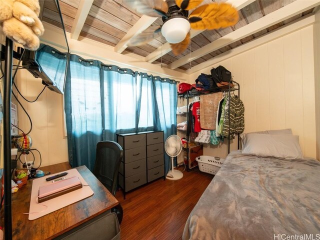 bedroom with beamed ceiling, ceiling fan, wood ceiling, and dark wood-type flooring