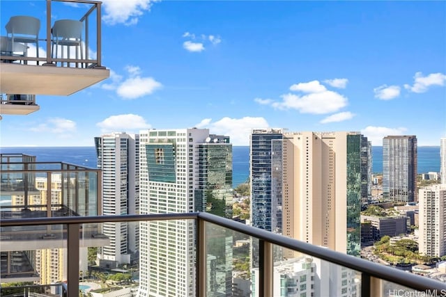 balcony featuring a water view