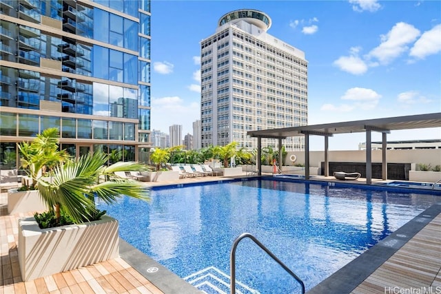 view of pool featuring a patio