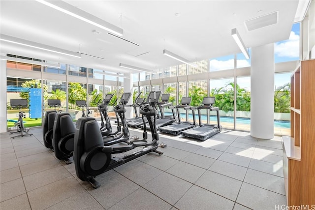 gym featuring a wall of windows