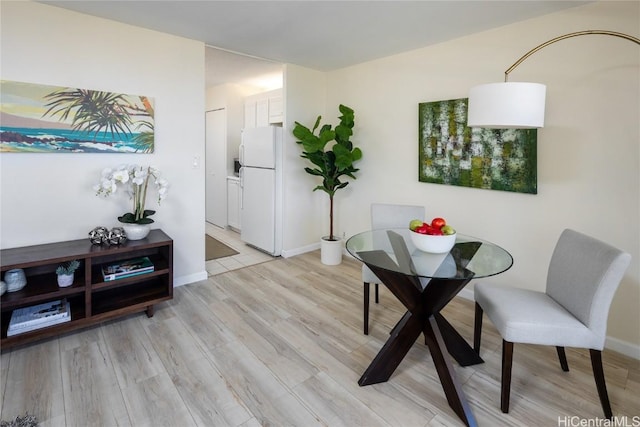 dining area featuring light hardwood / wood-style flooring