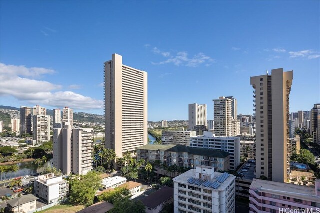 property's view of city with a water view