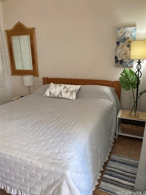 bedroom with tile patterned flooring