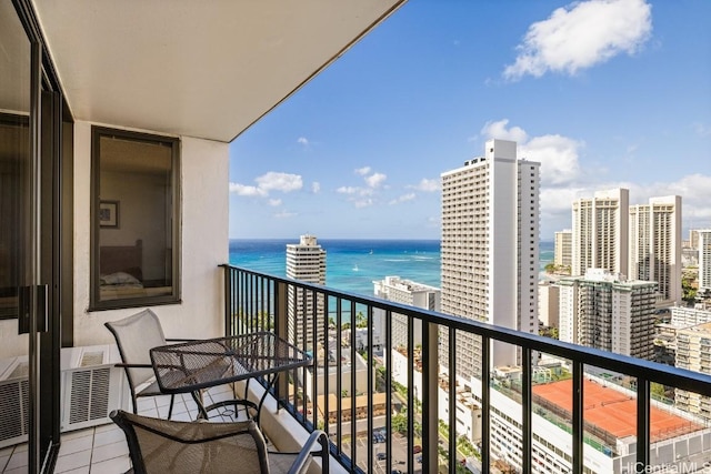 balcony featuring a water view